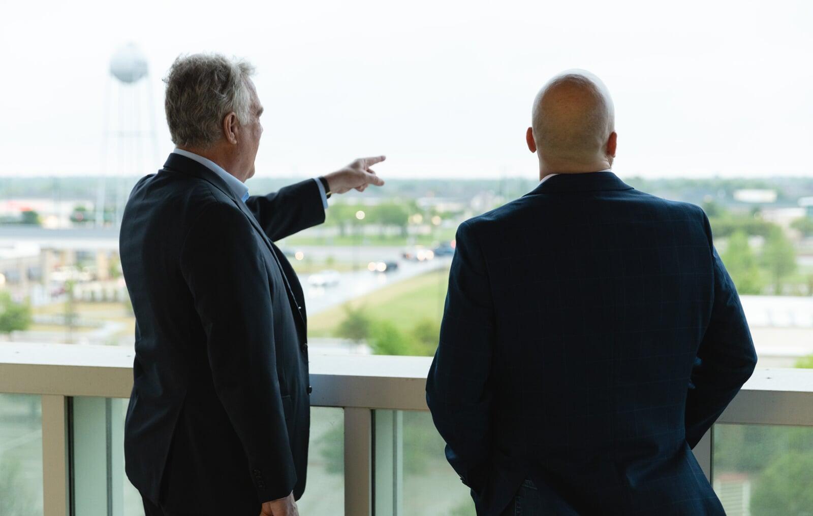 Super Dave Quinn speaking with Mayor of Fairview looking out over the Town from Town Hall balcony 